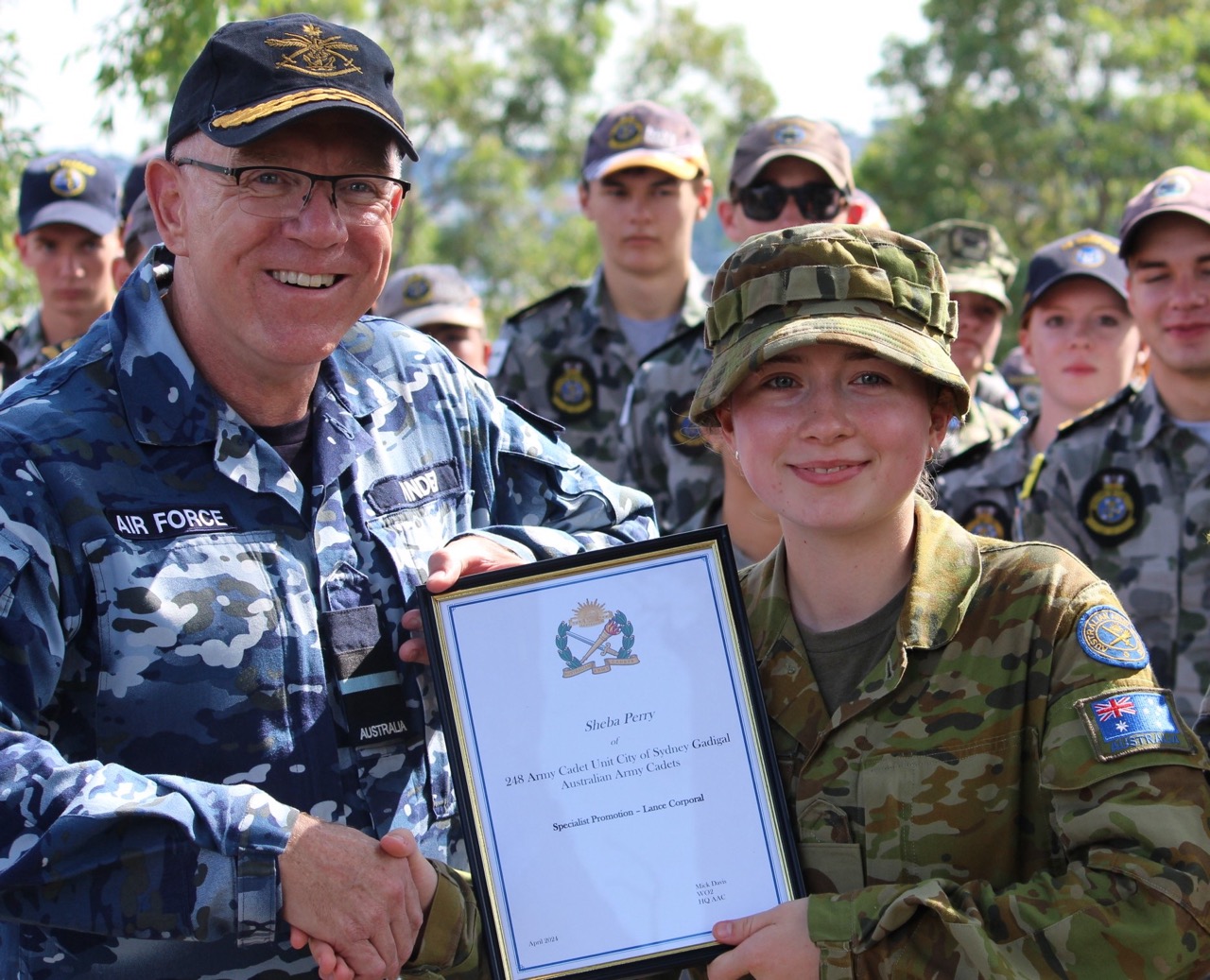 Image 3: Australian Army Cadet Sheba Perry receiving promotion to Lance Corporal by Deputy of Australian Defence Force Cadets, Air Force Commodore Grant Pinder on Cockatoo Island.